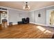 Beautiful room with hardwood floors, a decorative ceiling, and a large doorway at 528 Sherrill Ave, Lincolnton, NC 28092