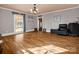 Bright living room showcasing hardwood floors, a large window, and a decorative ceiling fixture at 528 Sherrill Ave, Lincolnton, NC 28092