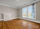 Bright room featuring a decorative fireplace and a large window at 528 Sherrill Ave, Lincolnton, NC 28092