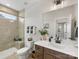 Stylish bathroom with a glass-enclosed shower, dual vanity, and modern fixtures at 702 Yucatan Dr, Waxhaw, NC 28173