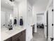 Bright bathroom vanity area with white countertop and mirror at 702 Yucatan Dr, Waxhaw, NC 28173