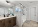 Contemporary bathroom featuring a glass-enclosed shower, white subway tile, and modern vanity at 702 Yucatan Dr, Waxhaw, NC 28173