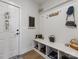 Inviting mudroom with built-in bench, storage, and charming decor for an organized entryway at 702 Yucatan Dr, Waxhaw, NC 28173