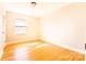 Cozy bedroom featuring hardwood floors and natural light, creating a relaxing retreat at 7231 Lockmont Dr, Charlotte, NC 28212