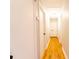 Hallway has hardwood floors and several white painted doors with black hardware at 7231 Lockmont Dr, Charlotte, NC 28212