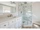Modern bathroom featuring a marble vanity, sleek fixtures, and a glass shower enclosure with marble-look tile at 801 Requa Rd, Cherryville, NC 28021