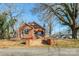 Charming brick home with a cozy front porch and well-manicured lawn at 801 Requa Rd, Cherryville, NC 28021