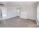 Inviting living room with fresh paint, new flooring, and a classic fireplace, perfect for relaxing and entertaining at 801 Requa Rd, Cherryville, NC 28021