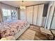 Bedroom featuring a private deck, large closets, and natural light, great for relaxation at 9009 Cebu Ct, Fort Mill, SC 29708
