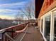 Relaxing deck area includes a hammock and adjoins the house through sliding glass doors at 9009 Cebu Ct, Fort Mill, SC 29708
