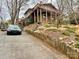 View of a home showing a car in the driveway and an elevated deck at 9009 Cebu Ct, Fort Mill, SC 29708