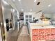 Updated kitchen with stainless steel appliances and modern lighting, open to the living area at 9009 Cebu Ct, Fort Mill, SC 29708