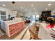 Bright, open-concept space with white kitchen island and lots of natural light at 9009 Cebu Ct, Fort Mill, SC 29708