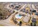 A birds eye view of neighborhood with a community pool and playground; a social hub for residents at 11502 Wilson Mill Ln, Pineville, NC 28134