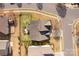 An aerial view of a single Gathering home with a fenced backyard and a deck in a residential neighborhood at 11502 Wilson Mill Ln, Pineville, NC 28134