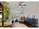 Bright home office with hardwood floors, wainscoting, and a large window with plantation shutters at 11602 Warfield Ave, Huntersville, NC 28078