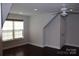 An angled bedroom with recessed lighting, ceiling fan, window, and dark hardwood floors at 1220 Avalon Pl, Matthews, NC 28104