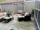 Inviting outdoor space with patio seating and a charming swing at 1220 Avalon Pl, Matthews, NC 28104