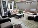 Well furnished outdoor patio featuring comfortable seating and a relaxing ambiance at 1220 Avalon Pl, Matthews, NC 28104
