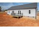 A cozy backyard with a deck provides the perfect space for relaxing and entertaining outdoors at 1282 Beal Rd, Lincolnton, NC 28092