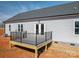 New backyard deck features a sleek black railing, offering an outdoor living space at 1282 Beal Rd, Lincolnton, NC 28092