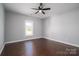 Spacious bedroom with ceiling fan, neutral walls, and hardwood flooring at 1282 Beal Rd, Lincolnton, NC 28092