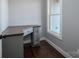 Cozy office space with custom built-in desk, ample storage, and a bright window at 1282 Beal Rd, Lincolnton, NC 28092