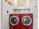 Functional laundry room features side-by-side washer and dryer at 130 Ketchie Dr, Mooresville, NC 28115