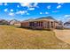 Exterior rear elevation featuring a screened in porch and an outdoor pool at 130 Ketchie Dr, Mooresville, NC 28115