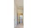Hallway with plush carpet, featuring views of the neighboring room through a doorway at 1307 Cerium Way, Charlotte, NC 28211