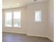 Bright and airy living room with large windows offering ample natural light at 1307 Cerium Way, Charlotte, NC 28211