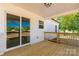 View of back deck with sliding glass door leading to the home interior at 1311 Mack Dr, McConnells, SC 29726
