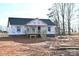 New single-story home in the process of being built with a covered front porch at 1311 Mack Dr, McConnells, SC 29726