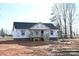 New single-story home in the process of being built with a covered front porch at 1311 Mack Dr, McConnells, SC 29726
