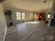 Spacious living room with new floors, natural light, and ample room for furnishings at 1358 Sandiwood Ct, Claremont, NC 28610