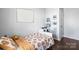 Bright bedroom with stylish decor, hardwood floors, and a built-in bed frame at 1601 Rosegate Ln, Stanfield, NC 28163