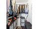 Walk-in closet featuring ample storage space, shelving, and hanging racks at 1601 Rosegate Ln, Stanfield, NC 28163