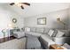 Bright living room features a large sectional couch and a patterned rug at 1601 Rosegate Ln, Stanfield, NC 28163