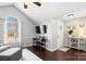 Bright living room features a large arched window and a ceiling fan at 1601 Rosegate Ln, Stanfield, NC 28163