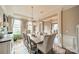 Sophisticated dining room with neutral paint, natural light, and an open layout to the foyer at 2027 Gloucester St, Matthews, NC 28104