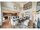Spacious living room with high ceilings, hardwood floors and open concept to the kitchen at 2027 Gloucester St, Matthews, NC 28104