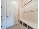 Mud room with storage bench and coat hooks, a convenient entry from outside at 2027 Gloucester St, Matthews, NC 28104