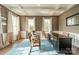 Elegant study with coffered ceiling, hardwood floors, and large windows offering ample light at 2027 Gloucester St, Matthews, NC 28104