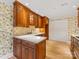 Well-equipped kitchen with custom cabinets and stainless steel appliances at 2027 Meadowood Ln, Charlotte, NC 28211