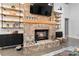 Close-up of a stunning brick fireplace with elegant decor, creating a cozy focal point in the living space at 2288 Boheler Rd, Clover, SC 29710