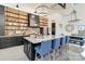 Stunning kitchen features a large island, brick backsplash, and open shelving for a modern rustic aesthetic at 2288 Boheler Rd, Clover, SC 29710