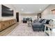 Inviting living room with hardwood floors, wainscoting, a modern TV and a comfortable sectional sofa at 2288 Boheler Rd, Clover, SC 29710