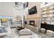 Comfortable living room with a brick fireplace, high ceilings, and stylish furnishings for a modern farmhouse feel at 2288 Boheler Rd, Clover, SC 29710