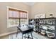 Office with a modern desk, shelving, rug, and large window with a view of the outdoors at 2288 Boheler Rd, Clover, SC 29710