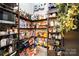 Walk-in pantry offers generous storage with shelving, and organization solutions for efficient kitchen management at 2288 Boheler Rd, Clover, SC 29710